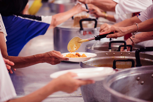 Meal distribution at Operation Ten City event